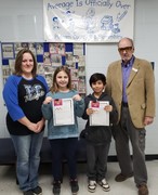 Pictured left to right: Mrs. Chapman, Devin, Diego, Mayor Pittman.